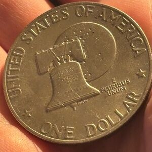 Bell and moon United States One Dollar Coin no mark